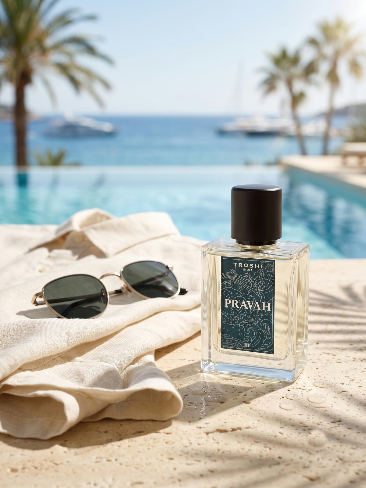 Pravah by a pool with linen and sunglasses